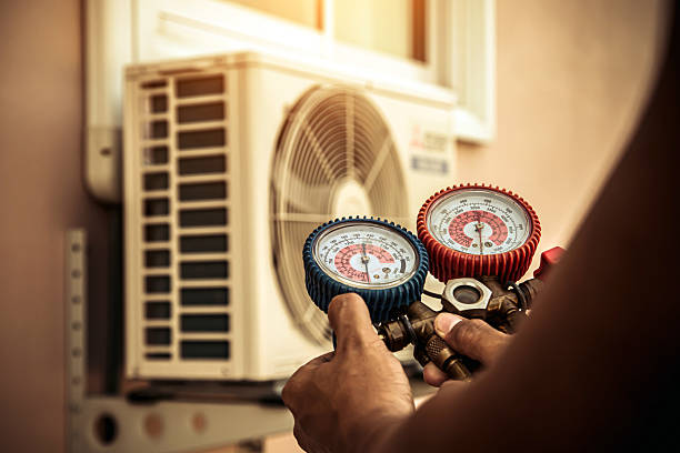 Professional Air Conditioning Service technician working in Davenport, FL